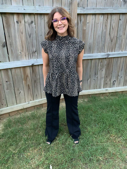 leopard print flutter-sleeved top buttons up the back.